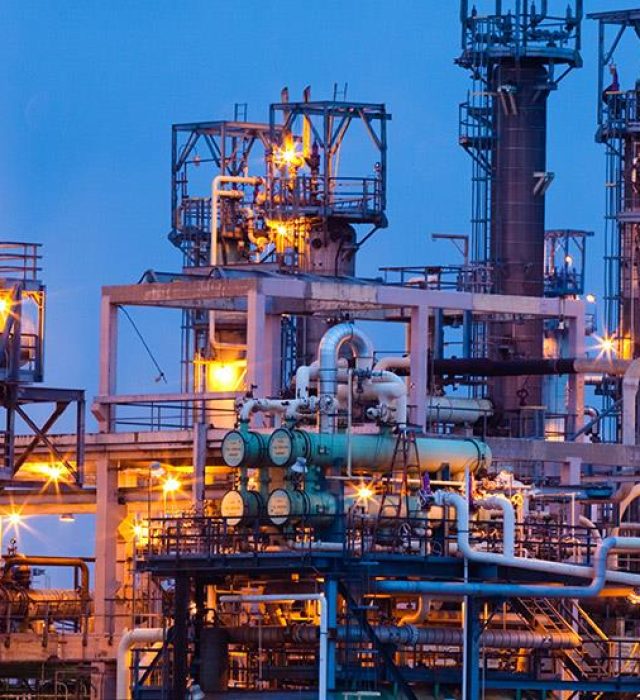 exterior shot of an oil refinery at dawn 1 4 1 11